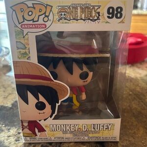 Pop Animation Figure with Red Hat and Blue Outfit